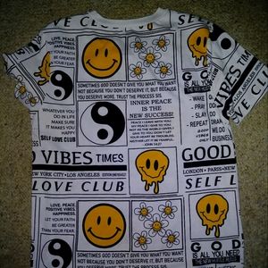 Graphic Smiley face t shirt. Size L. Womens . Brand -On Fire